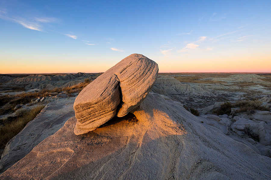 Scenic landscape photograph of Toadstool Geologic Park illuminated by last light in western Nebraska. - Nebraska Photography