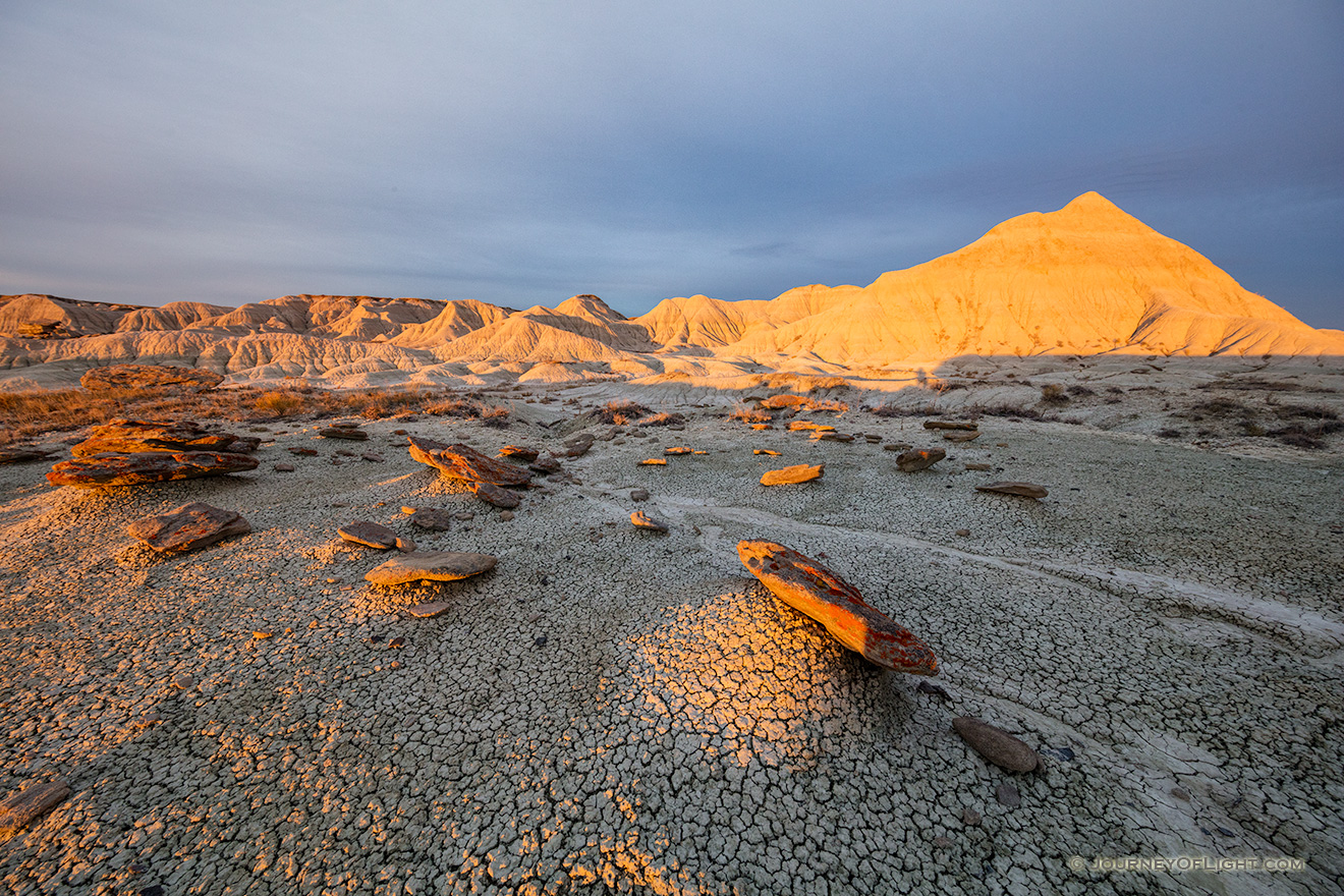 Scenic landscape photograph of Toadstool Geologic Park illuminated by morning light in western Nebraska. - Nebraska Picture