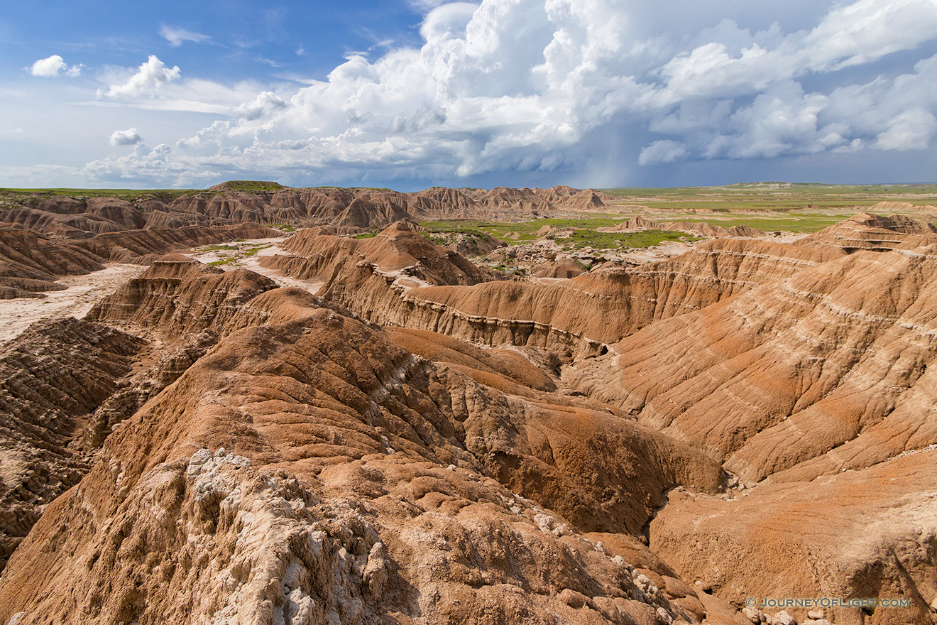 From a high point at Toadstool Geologic Park a storm can be seen in the distance moving slowly across the Oglala Grasslands. - Toadstool Geologic Park Picture