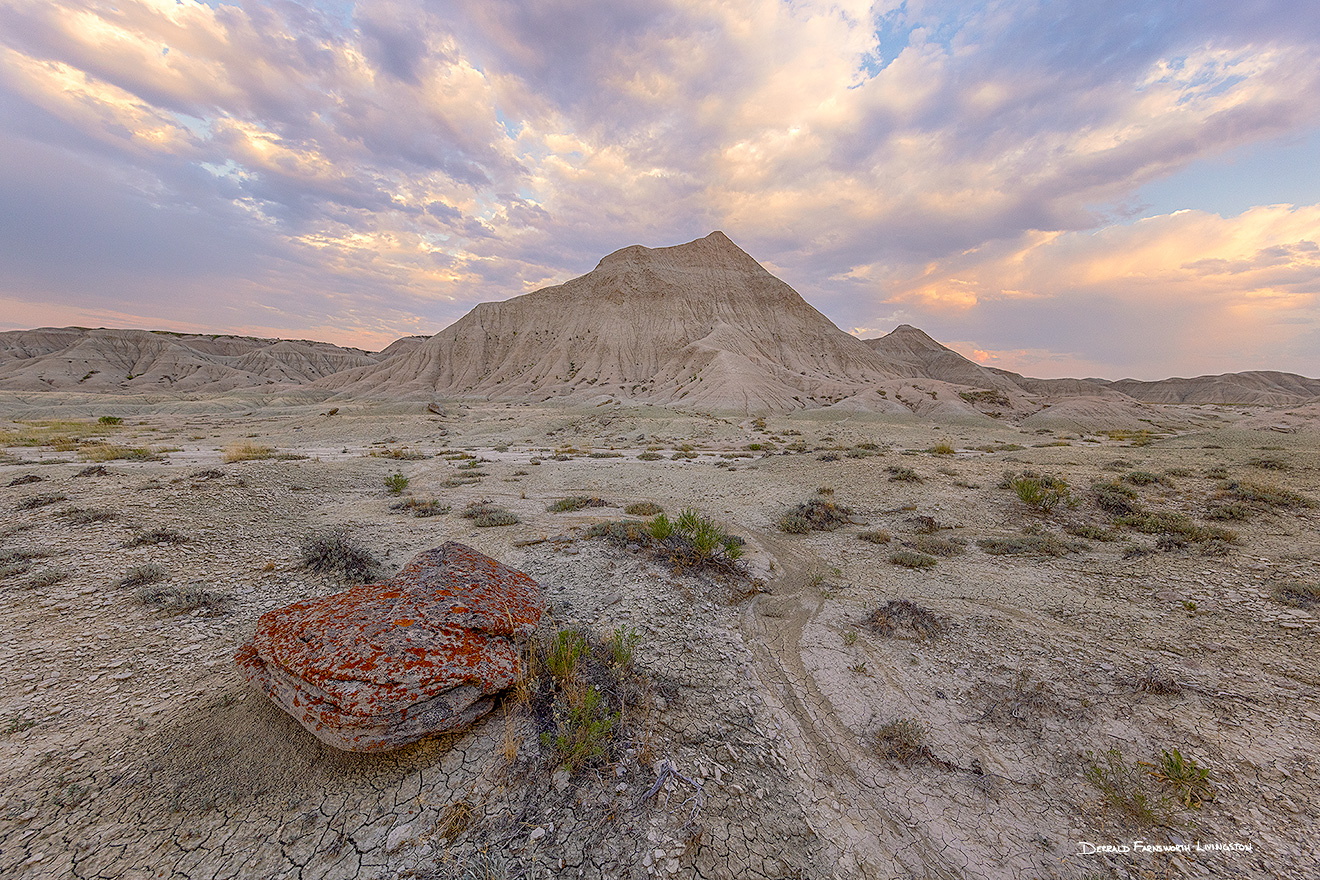 A scenic landscape photograph of twilight over the badlands Toadstool Geologic Park in western Nebraska. - Nebraska Picture