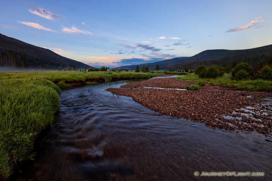 The head of the Colorado River runs through the Kawuneeche Valley in western Rocky Mountain National Park.  Here it is a quiet stream that is quite easy to across, much different than the raging river found at the bottom of the Grand Canyon. - Colorado Photography