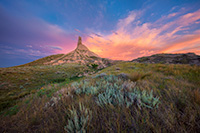 A scenic landscape photograph of a sunset and Chimney Rock National Historic Site. - Nebraska Photography