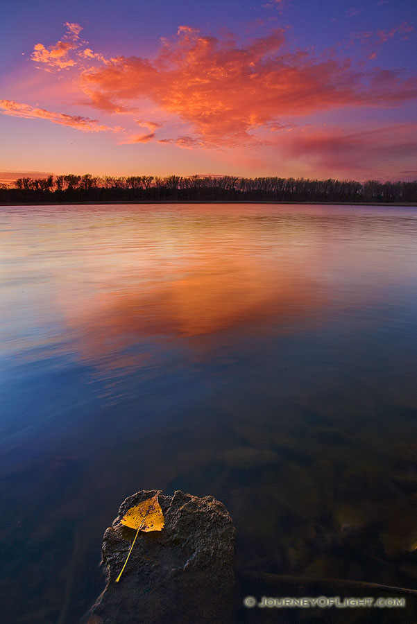 A light breeze moved the water along the DeSoto oxbow at DeSoto National Wildlife Refuge as the sun set below the horizon. - DeSoto Photography