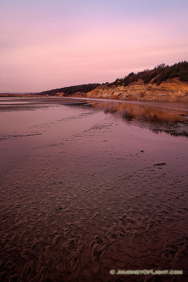 The Niobrara, on a quiet November morning flows quietly into the Missouri shaping and reshaping the landscape slowly.  Although the water from this river is done with this part of its travels, it still has a long journey before reaching the Gulf of Mexico hundreds of miles away. - Nebraska Photography