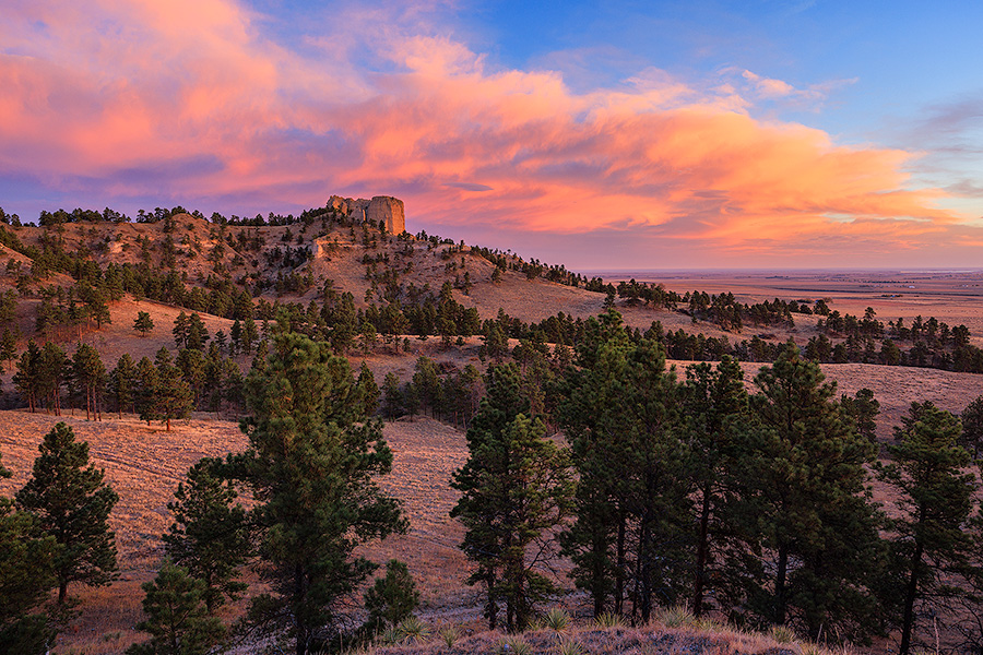 A scenic landscape photograph of a beautiful sunrise over Fort Robinson State Park in Northwestern Nebraska. - Nebraska Photography