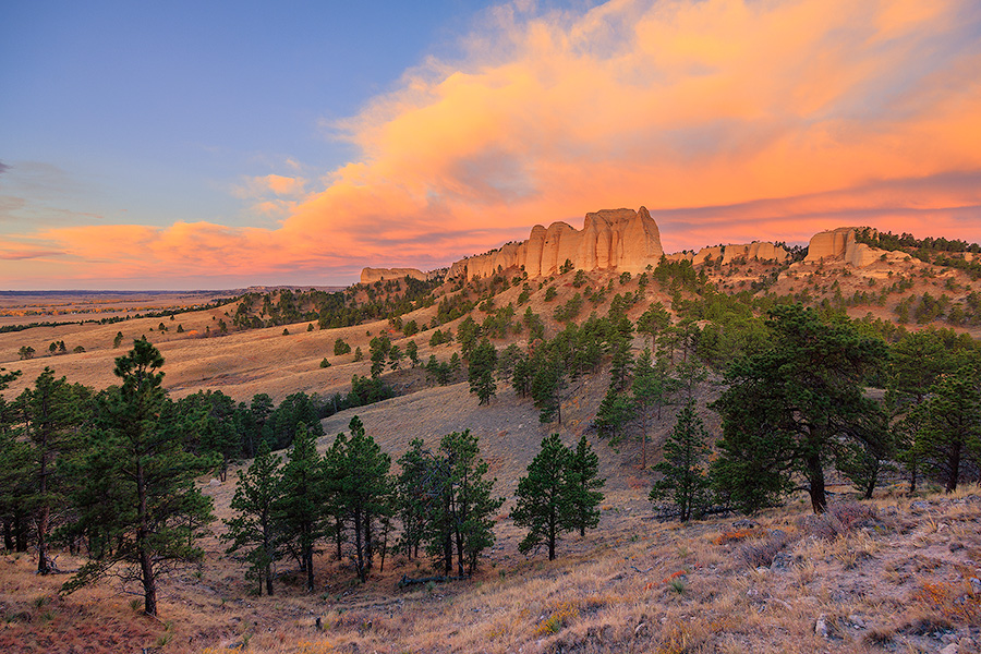 A scenic landscape photograph of a beautiful sunrise over Fort Robinson State Park in Northwestern Nebraska. - Nebraska Photography