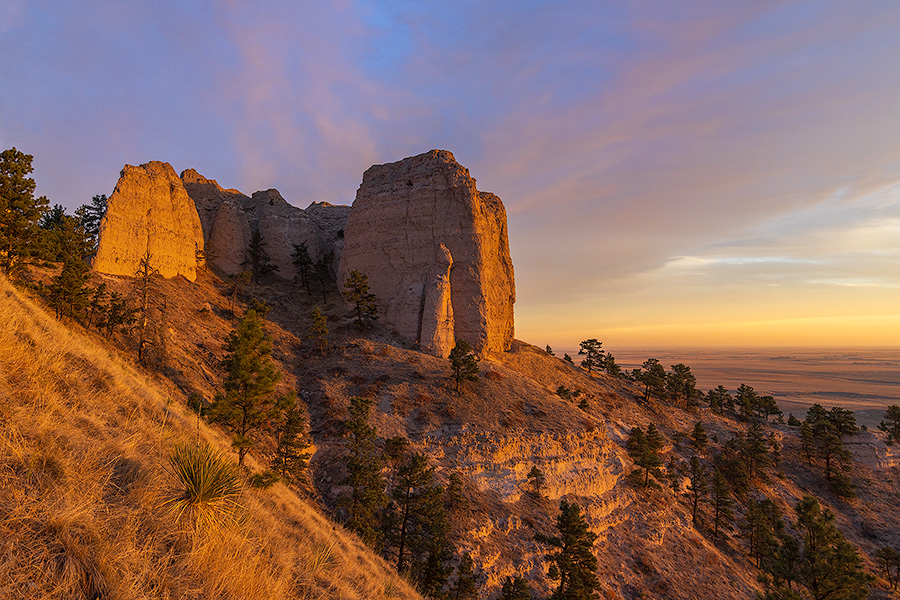 A scenic landscape photograph of a beautiful sunrise over Fort Robinson State Park in Northwestern Nebraska. - Nebraska Photography