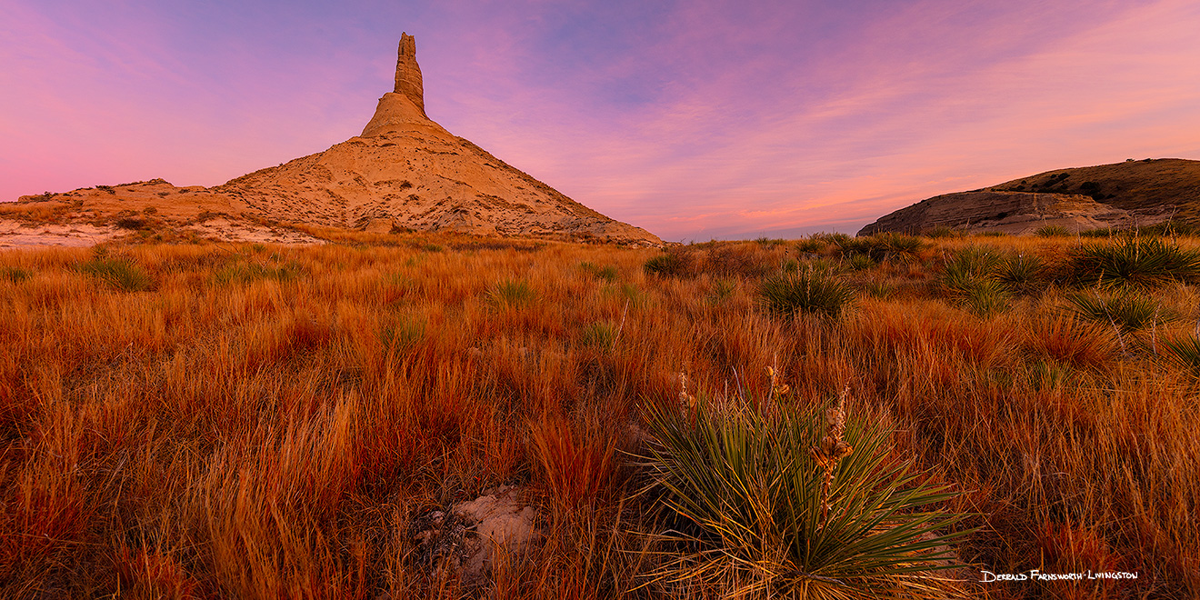 A scenic panoramic landscape Nebraska photograph of a sunset and Chimney Rock in western Nebraska. - Nebraska Picture