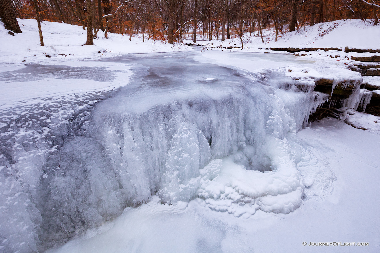 The waterfall in Platte River State Park is frozen solid during a frigid cold spell in late December. - Platte River SP Picture