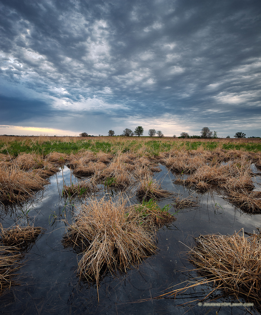 Clouds roll in and obscure the sun at Jack Sinn Wildlife Management Area. - Nebraska Picture