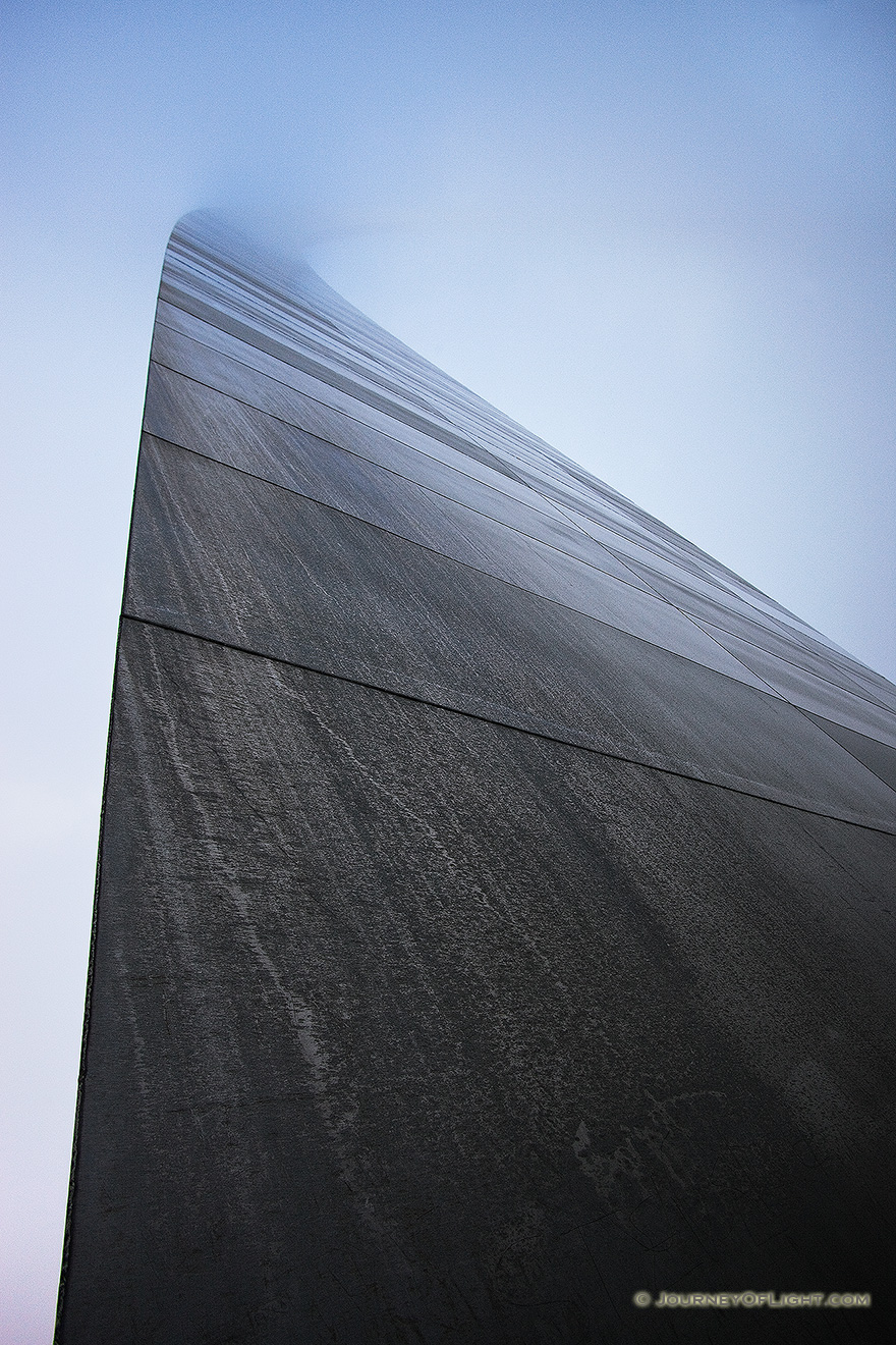 Into the fog the Gateway Arch in St. Louis dissappears.  - Jefferson National Expansion Memorial Picture