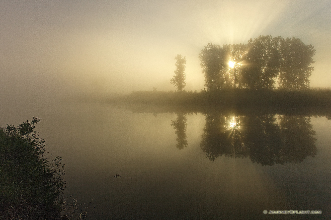 Morning fog rises from an offshoot of the Missouri at Ponca State Park in northeastern Nebraska. - Ponca SP Picture