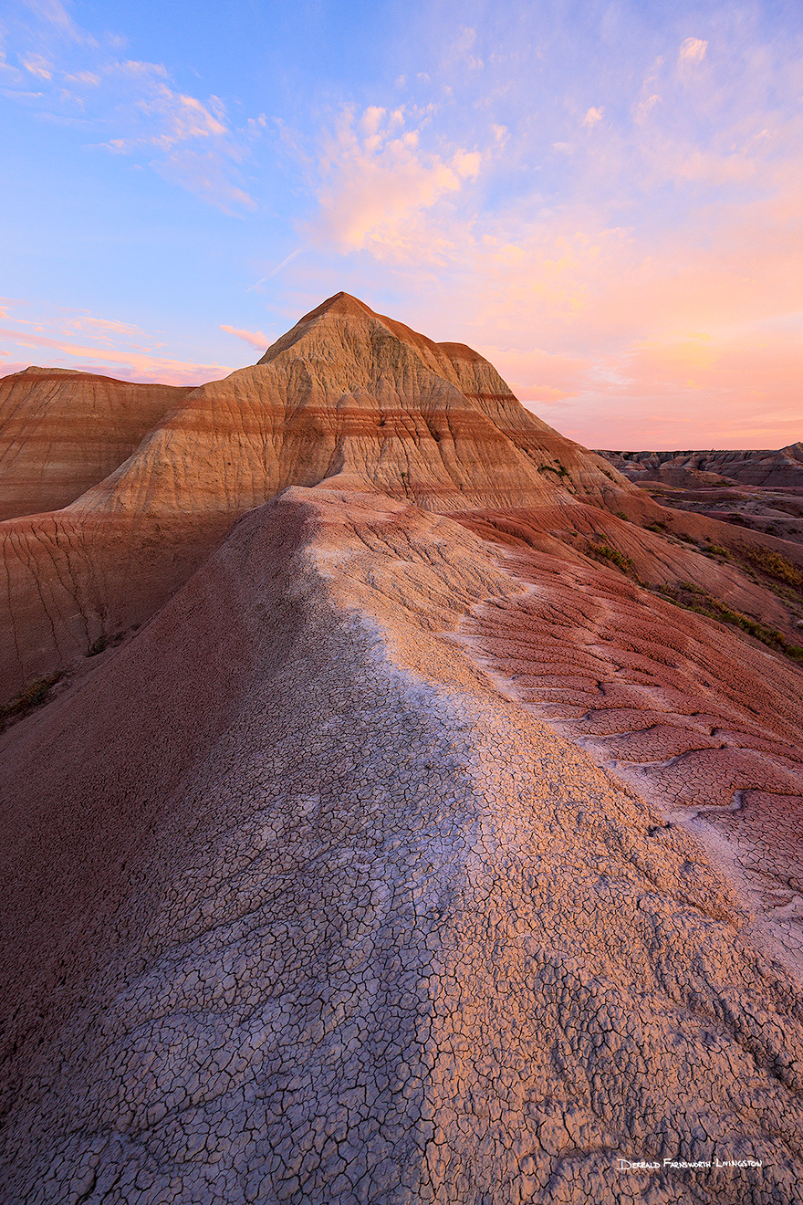 Scenic photograph of a sunrise over the Badlands National Park, South Dakota. - South Dakota Picture