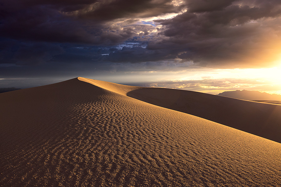 Scenic photograph of a sunset at White Dunes National Park, New Mexico. - New Mexico Photography