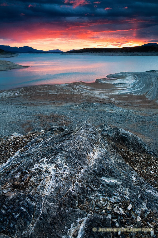 The sun illuminates the clouds on Lake Abraham on the Kootenay Plains in Western Alberta. - Alberta Photography